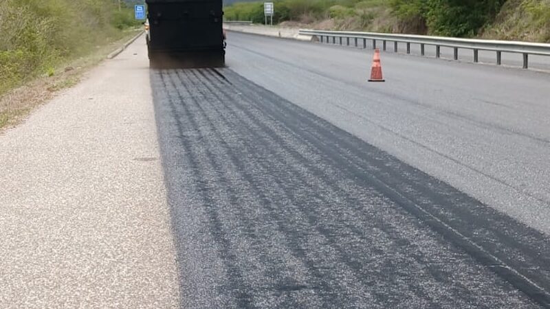applying rhinophalt on jamaican road