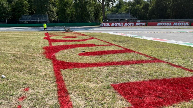 grass painting motorsport sponsor