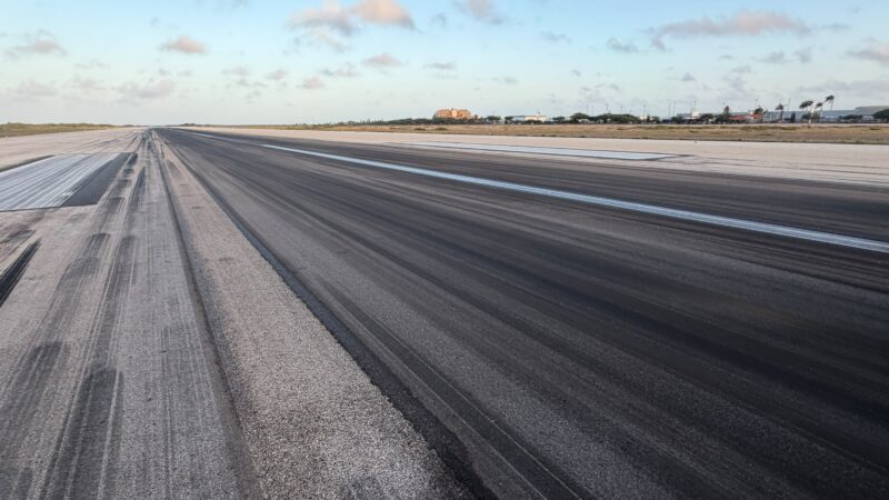 removing rubber from airport runways