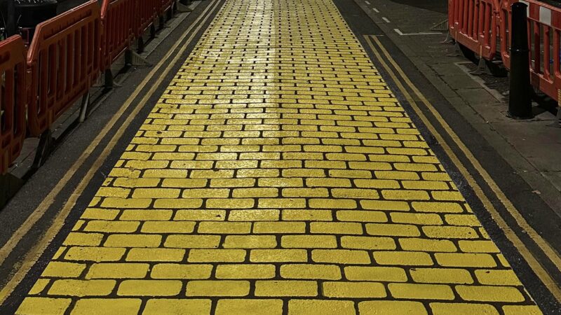 yellow brick lane road painting wicked movie roadgrip